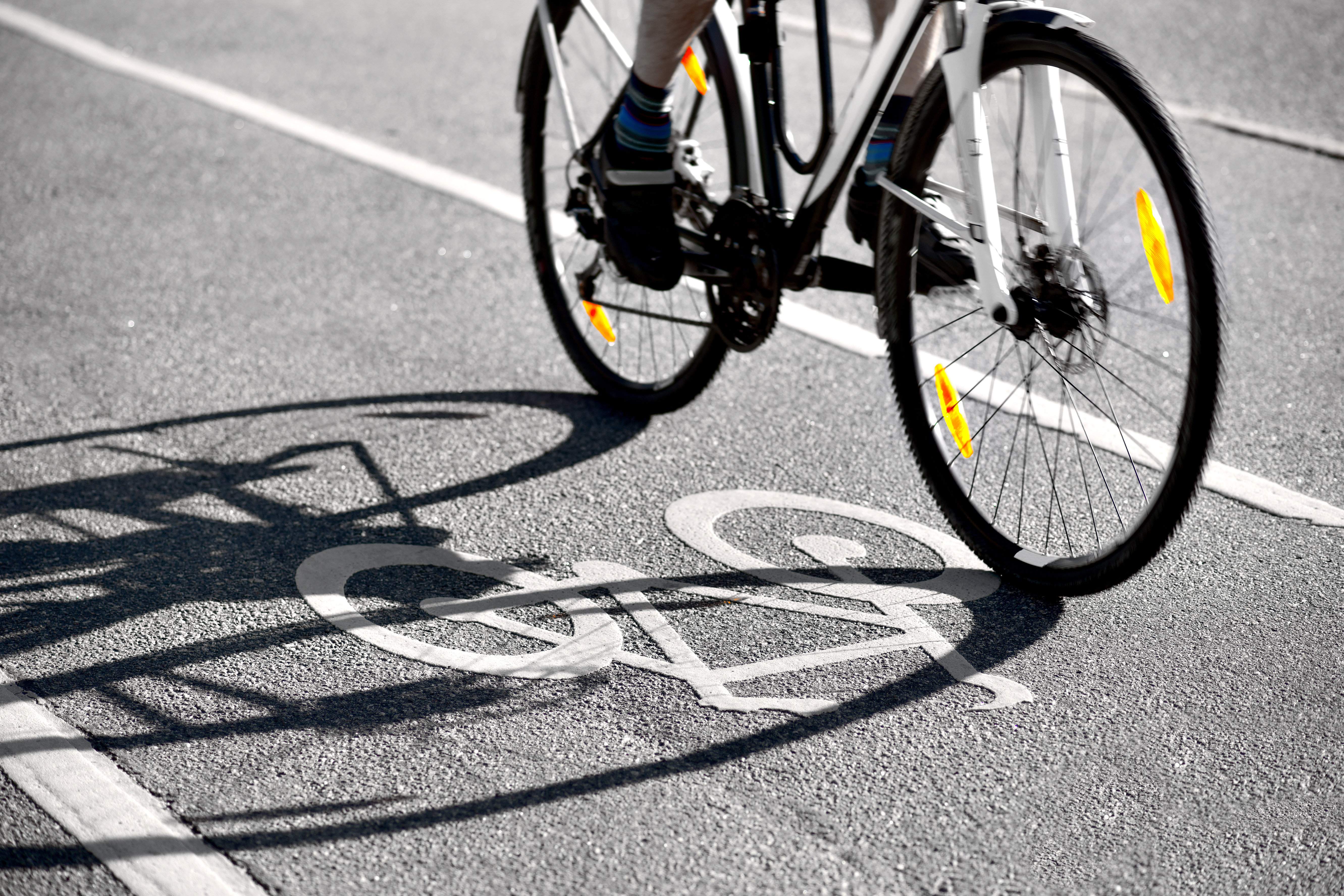 Shadow of a cyclist on a cyclist lane