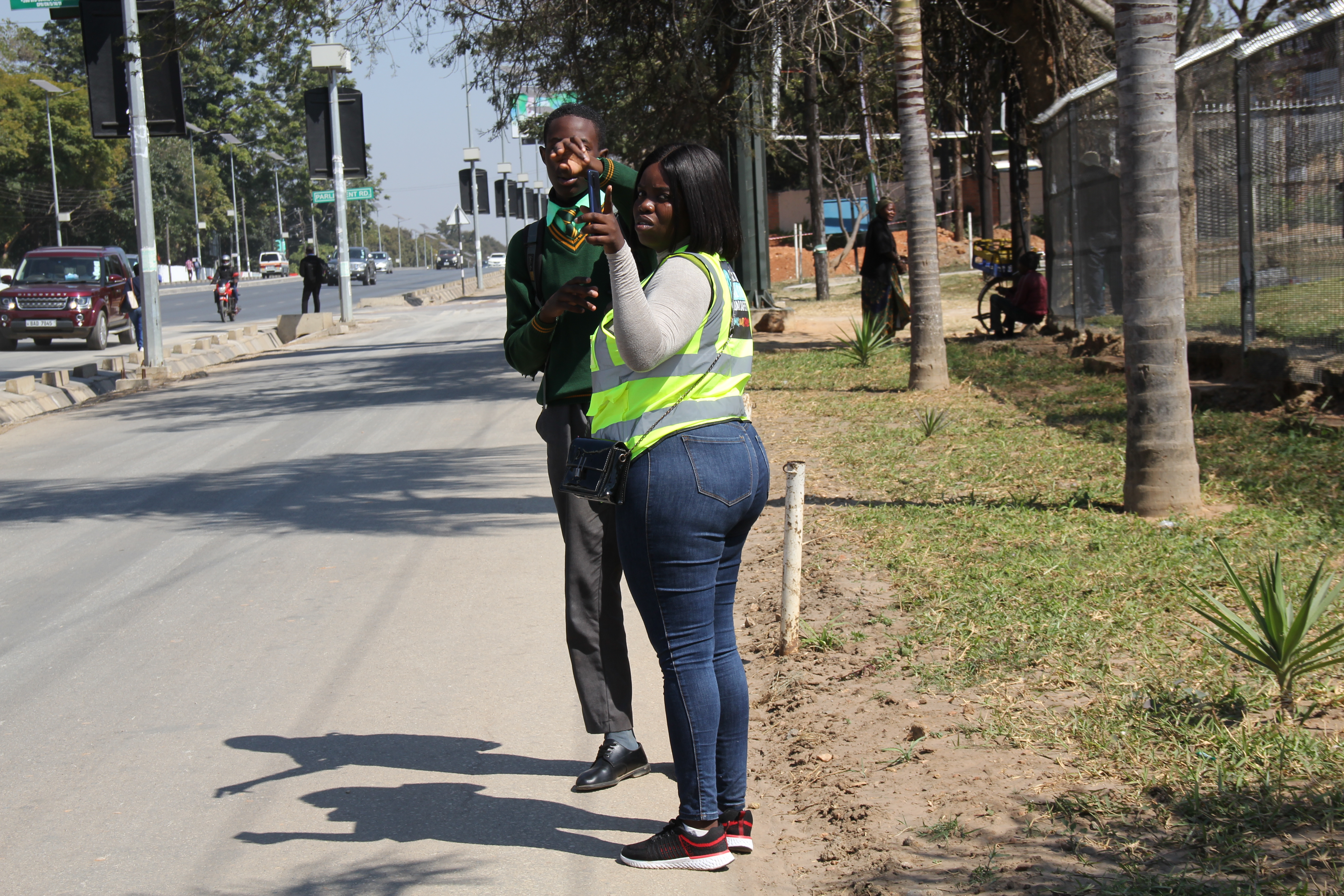 An road agent giving instructions in Lusaka, Zambia.