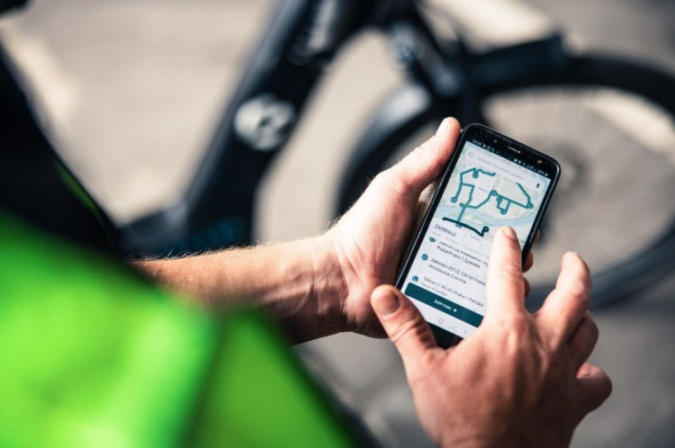 A delivery person with telephone