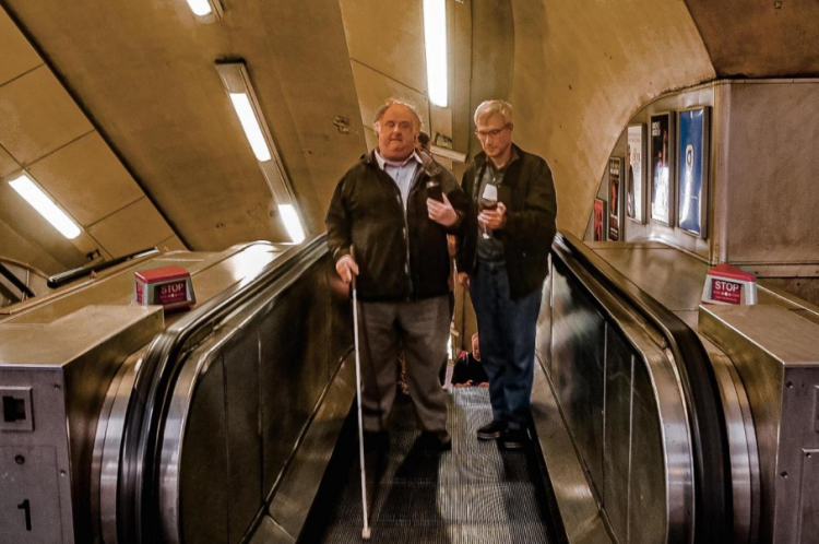 Person with visual impairment trying travelling in metro