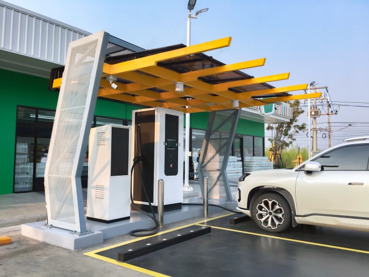 Electric car charging on a charging station
