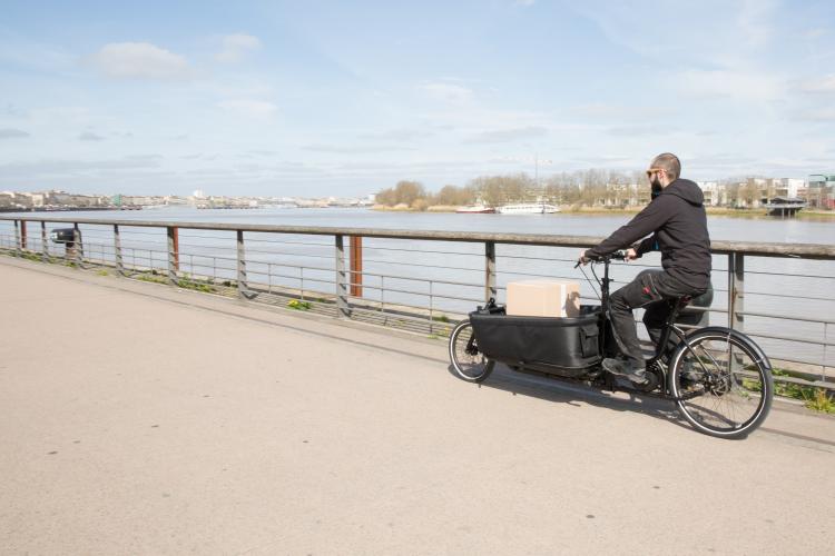 Man riding a cargo bike 