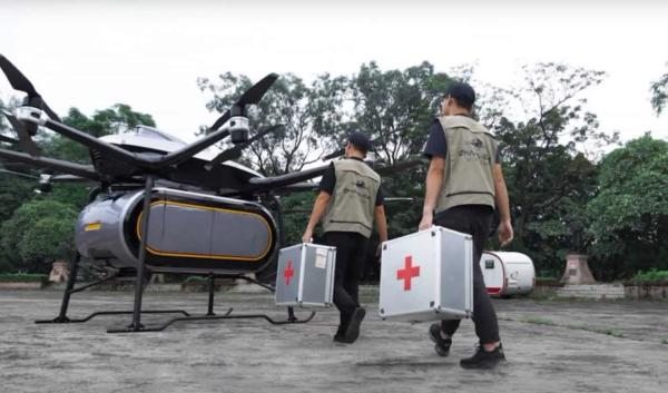 Emergency crew going towards an aerial vehicle 