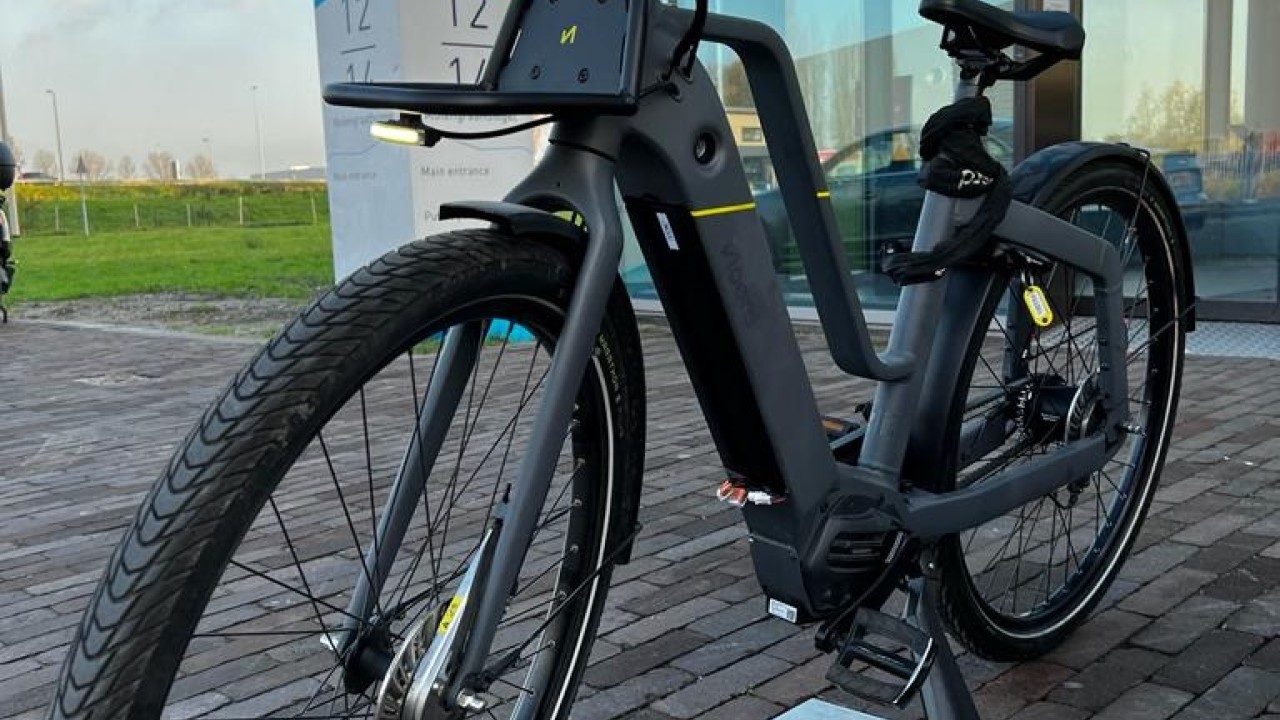 E-bike at TILER charging Tile at office building