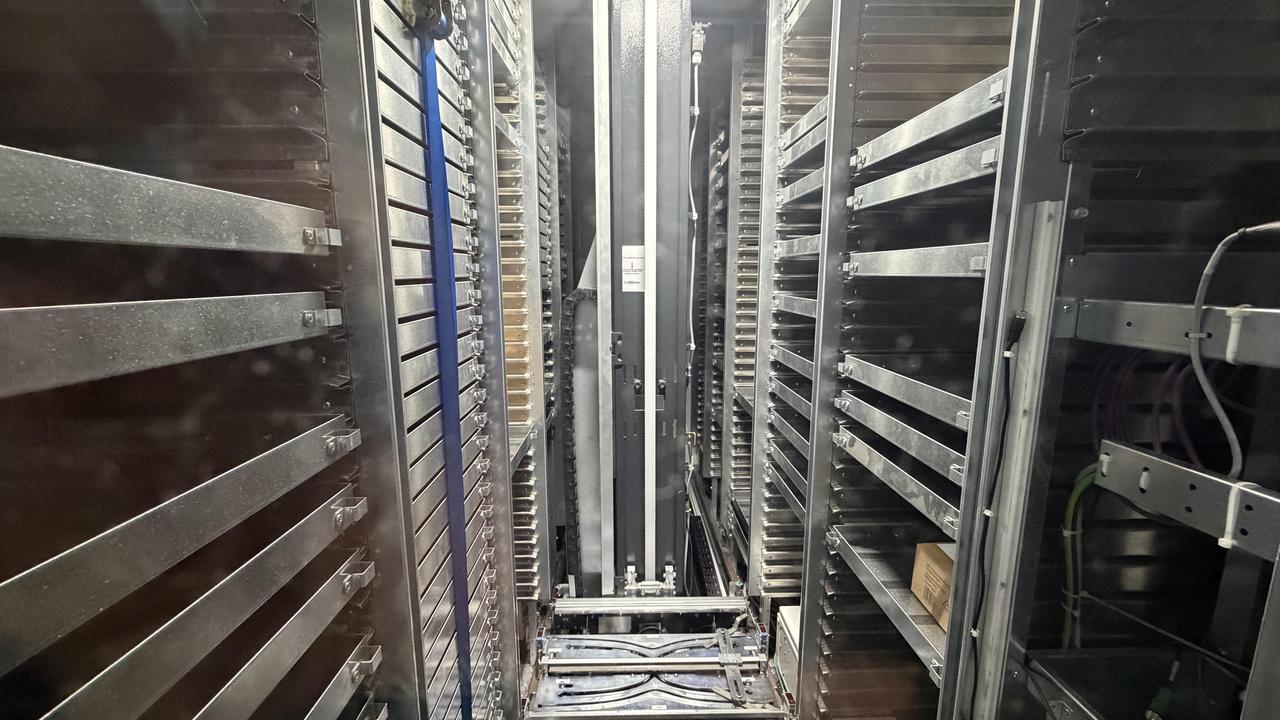 Smarcel ONE: Interior with open racks & robotics storage and retrieval system
