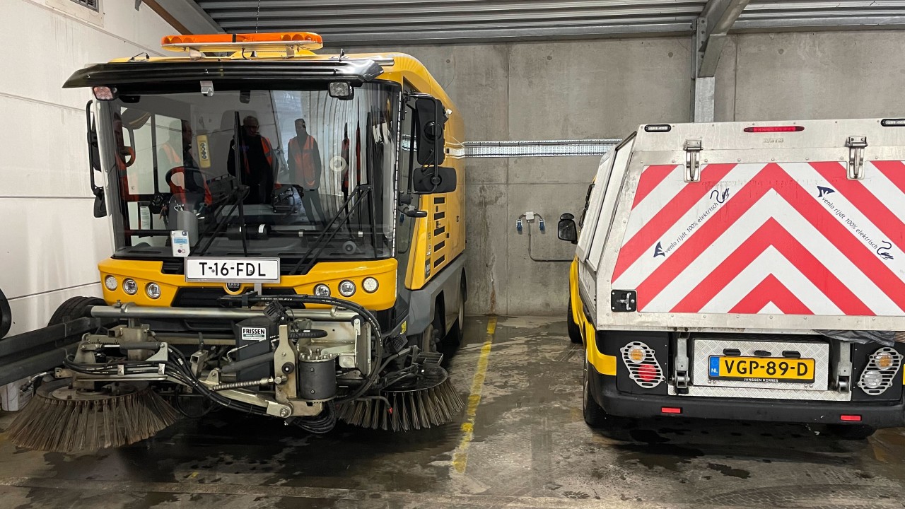 Parked municipal EV fleet vehicles in Venlo depot