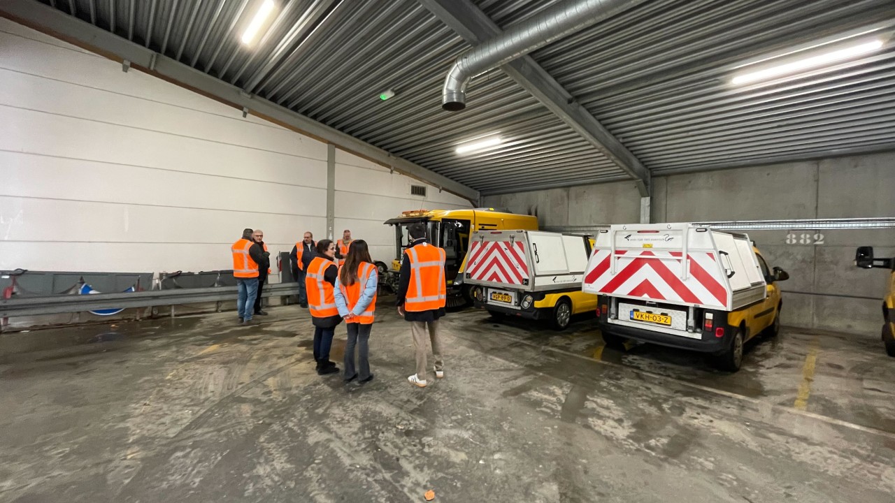 Parked municipal EV fleet vehicles in Venlo depot