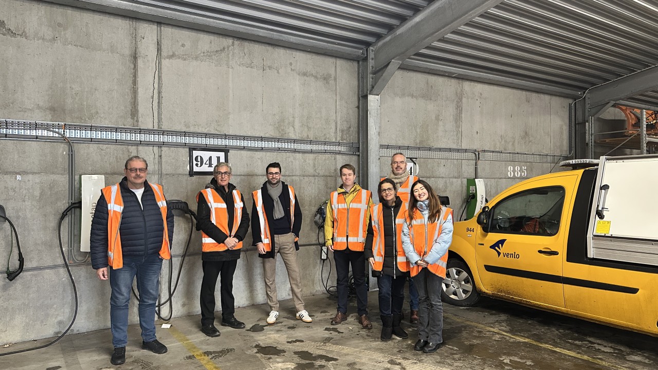Parked municipal EV fleet vehicles in Venlo depot