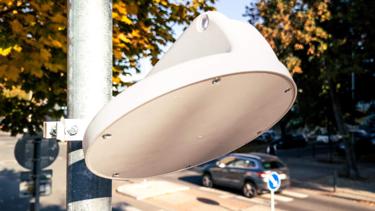 Bluetooth-based antenna developed by SparkPark attached to a sign-post